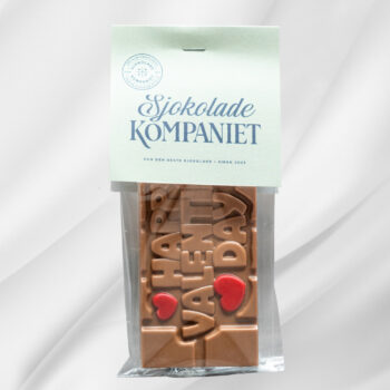 Bilde av sjokoladeplate preget med teksten «Happy Valentines Day» – laget av melkesjokolade og karamellsjokolade, formet som en romantisk gave til Valentinsdagen.