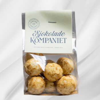 Bilde av Lakris – pose med ti sjokoladekuler fylt med lakriskrem, en eksklusiv og smakfull konfektopplevelse.