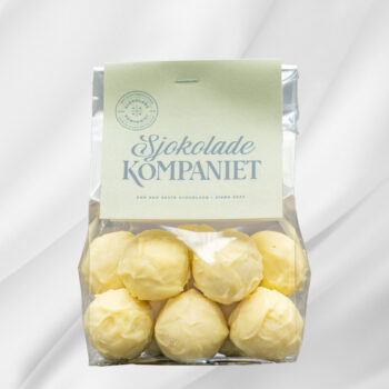 Bilde av Pasjonsfrukt – pose med ti hvite sjokoladekuler fylt med tropisk pasjonsfrukt, elegant presentert som gave.