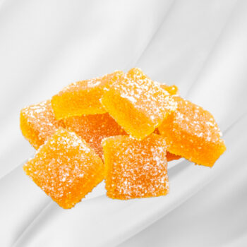 Bilde av Pasjonsfruktgele – liten eske med ni veganske ruter av hjemmelaget pasjonsfruktgelé, elegant presentert som gave.