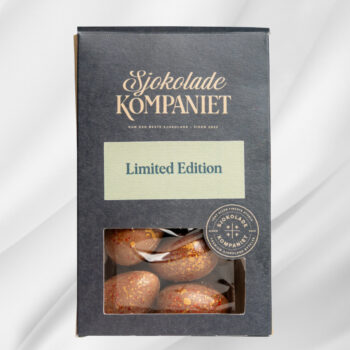 Bilde av en pose med 10 små påskeegg fra Sjokoladekompaniet, laget av lys og karamellisert sjokolade, fylt med hasselnøttkrem og crunchy Kunafa, presentert som en luksuriøs påskegave.